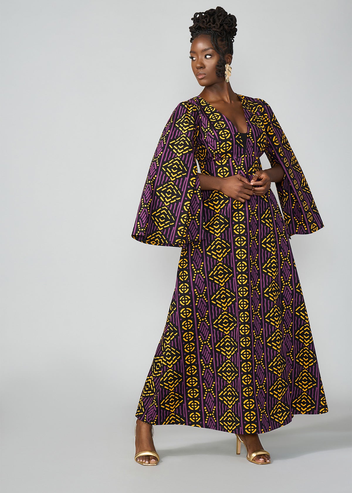 purple and gold african dress Bride In Off Shoulder African Print Dress With Gold Embellishments, Matching Clutch Purse and Purple Fan Gele