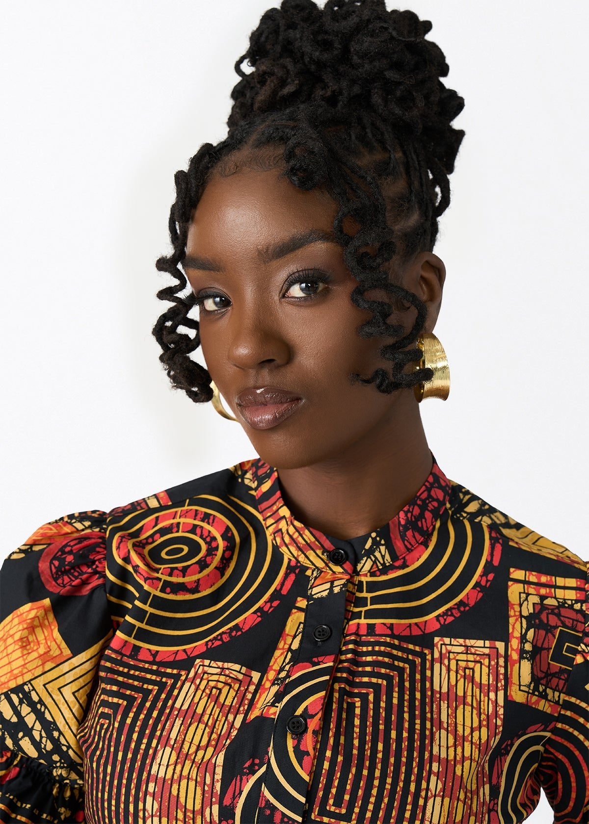 Manyara Women's African Print Peplum Blouse (Black Cinnamon Geometric) - D'IYANU
