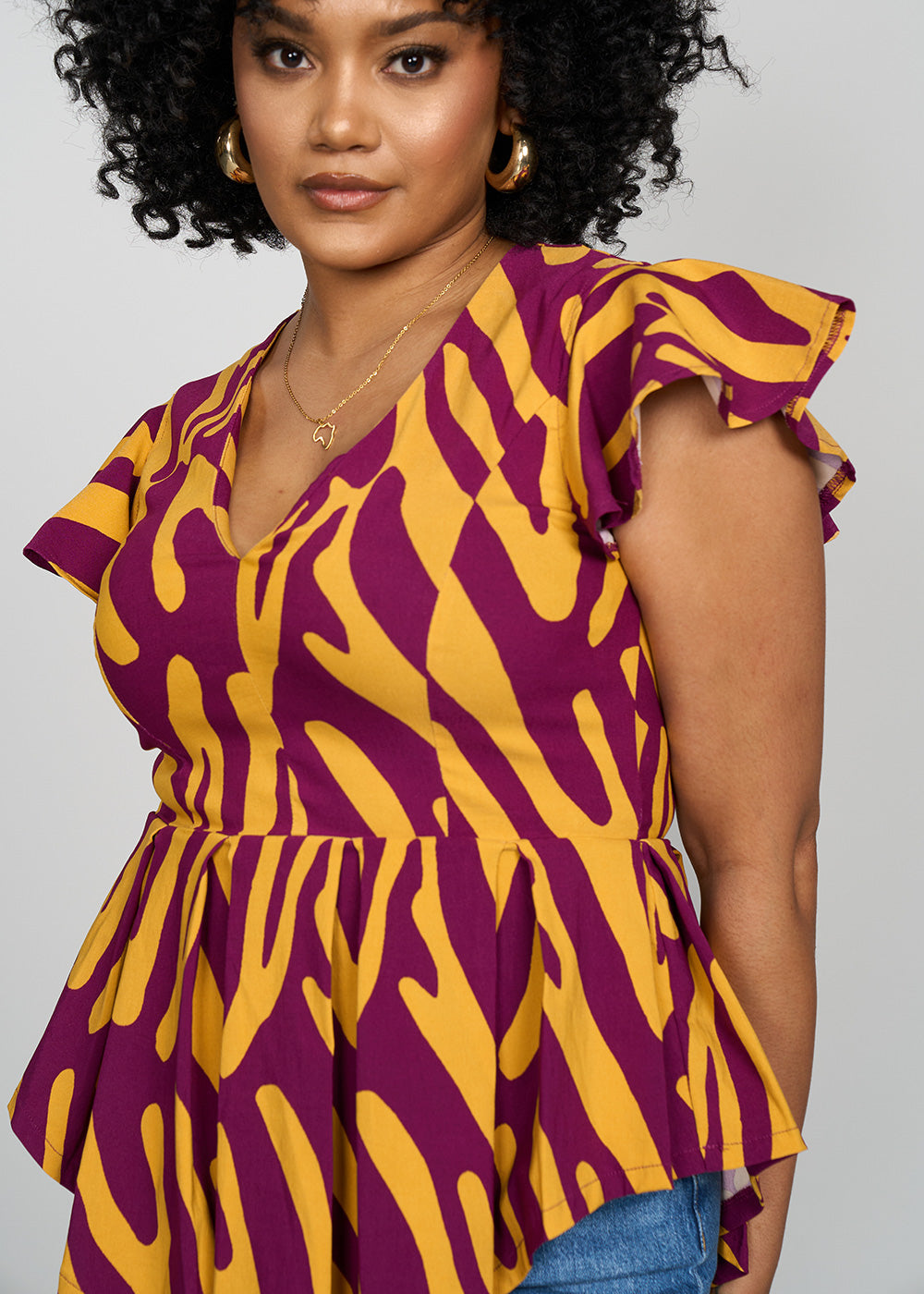african print peplum shirt