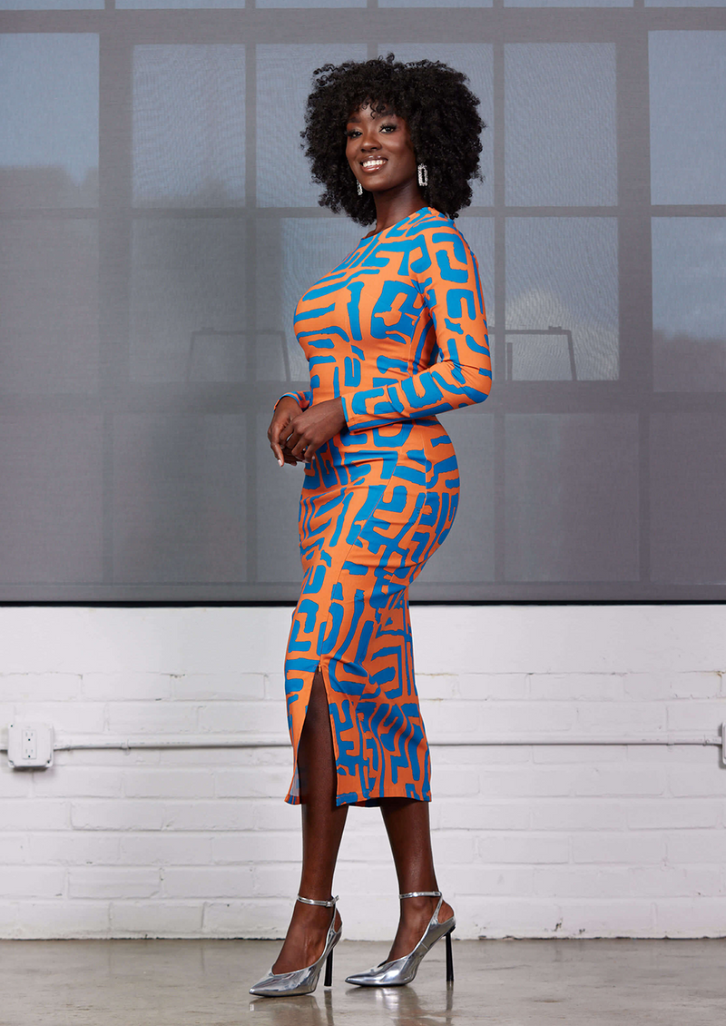 https://www.diyanu.com/cdn/shop/products/Womens-Chidima-African-Print-Tunic-Dress-Orange-Blue-Geometric_800x.png?v=1662107264